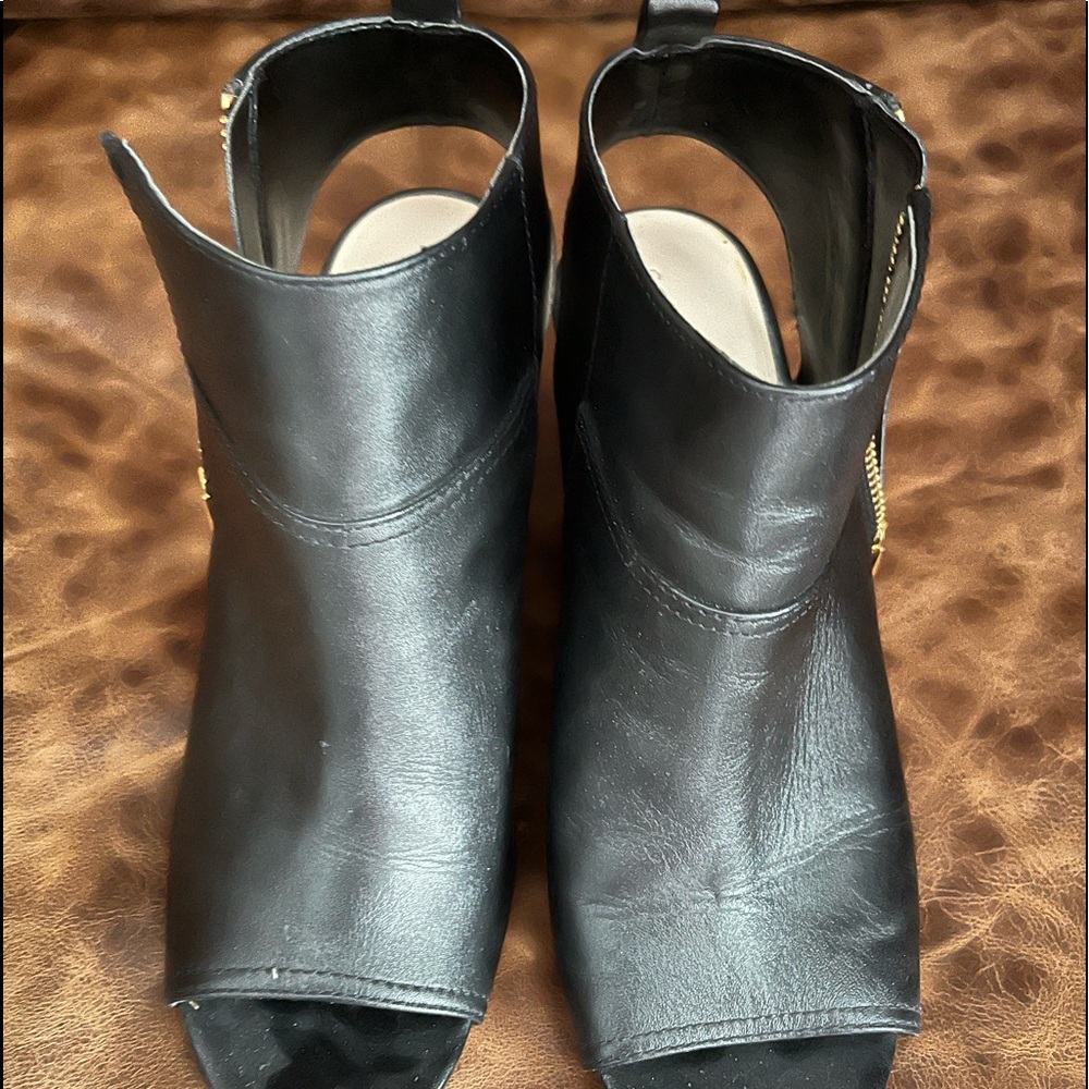 Cole Haan heeled open toe shoe size 8B. Slightly worn.